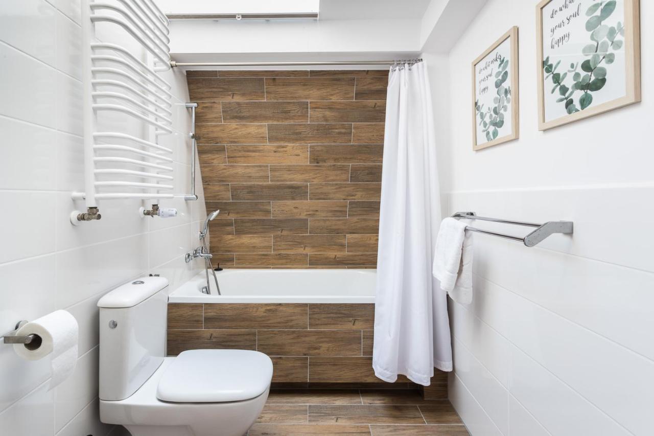Na Starowce / Old Town Apartment