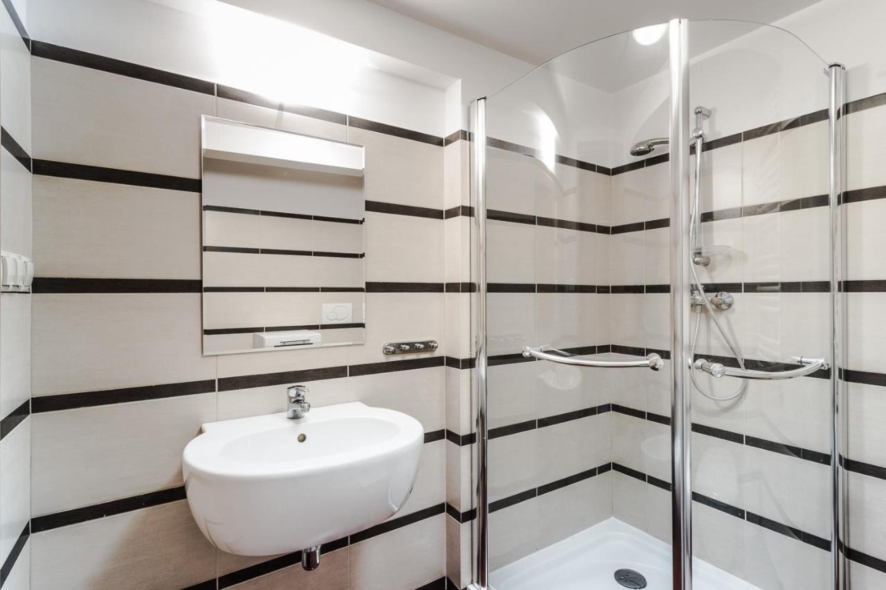 Na Starowce / Old Town Apartment